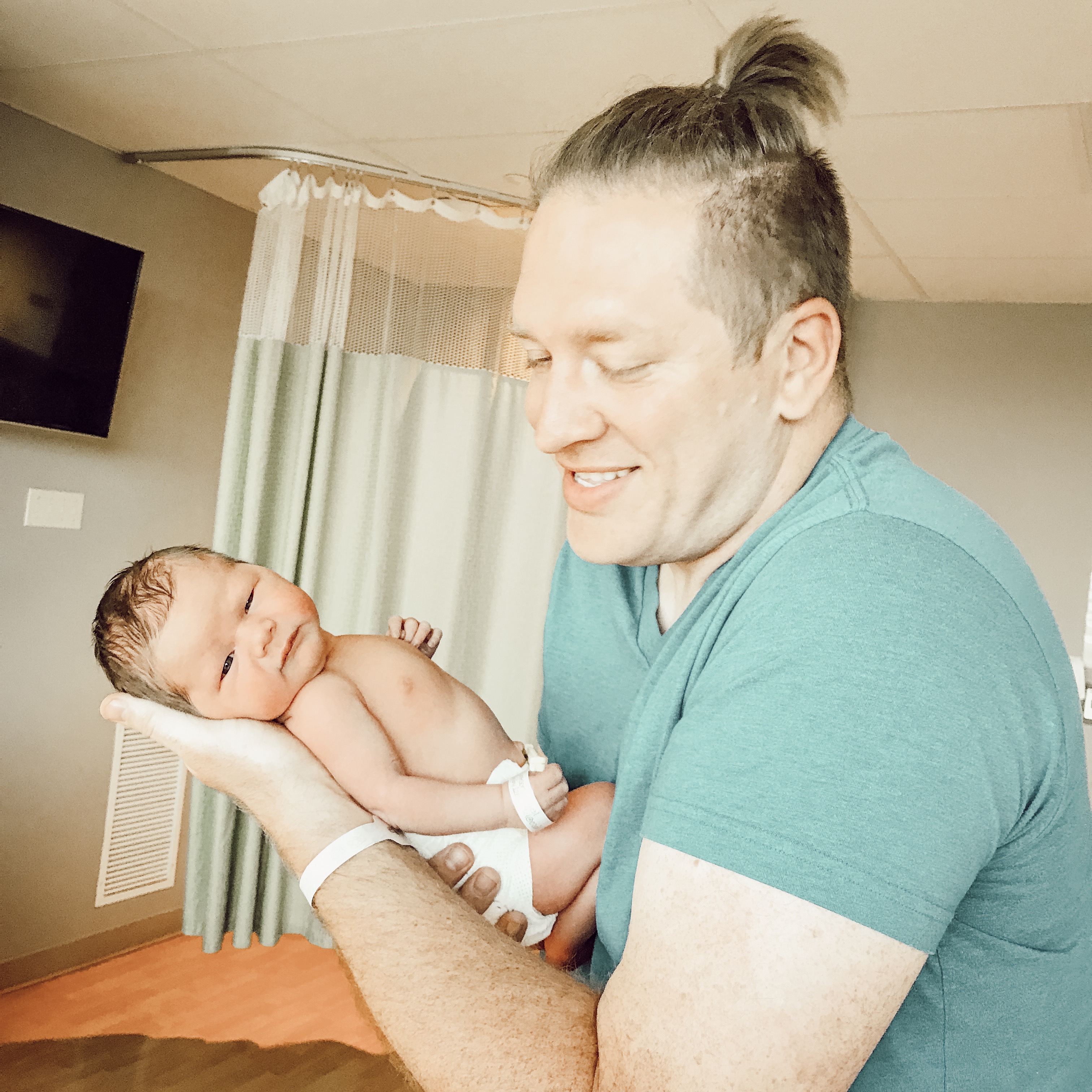 New dad with newborn baby boy